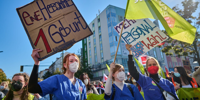 Health workers protest with members of German trade union Verdi