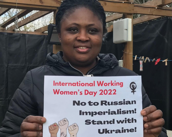 Woman with solidarity sign