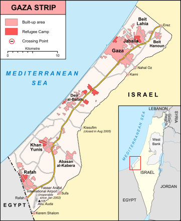 Map of the Gaza Strip showing major towns, refugee camps, crossing points, roads, and surrounding countries. The Mediterranean Sea lies to the west, Israel to the east, and Egypt borders the southern end near Rafah.