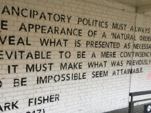 Mark Fisher quote about emancipatory politics on wall