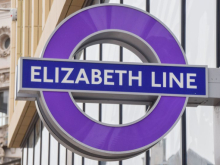 Photo of a purple Elizabeth line roundel