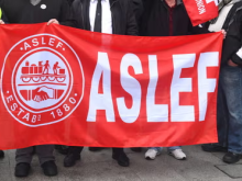 Red Aslef flag showing Aslef logo