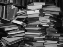 Black and white photo of a stack of books