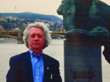 John Cunningham with Bibó statue