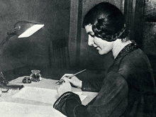 Larisa Reisner writing at her desk