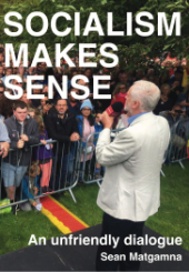 Book Cover "Socialism Makes Sense" in white text overlaid on a photo of Jeremy Corbyn addressing a crowd.