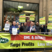 Strikers with placards and an RMT banner reading "DHL & Avanti: Huge Profits, Low Wages"