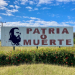 "Homeland or death": Signs and small billboard in Cuba with an image of Castro and this slogan are common