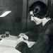 Larisa Reisner writing at her desk