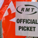 RMT official picket placard in front of a red RMT flag